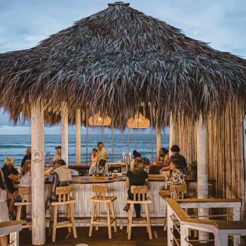 Johnny’s Beach Bar — Where His Spirit Meets the Sea There are places filled with echoes—echoes of laughter, courage, and dreams. At Long Bay Beach Resort, among crashing waves and golden sunsets, lies Johnny’s Beach Bar, a place deeply stitched with memories of Johnny Strange: adventurer, humanitarian, son, and friend.